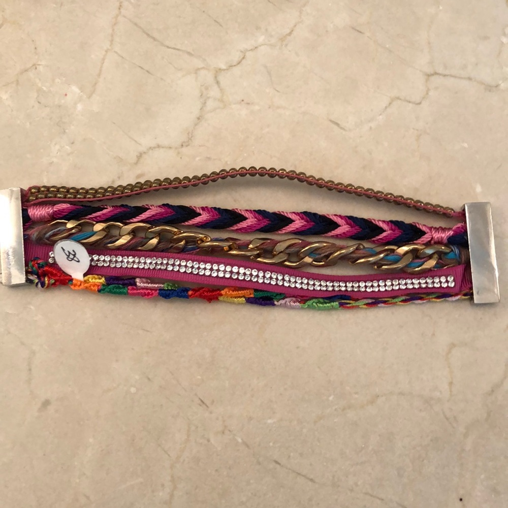 Multi strand bracelet with magnetic clasp
